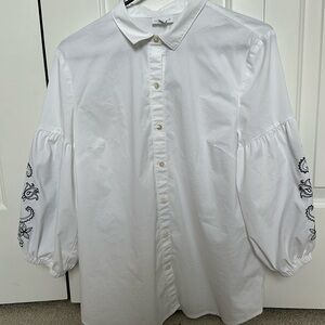 White button down blouse with black embroidery sleeves